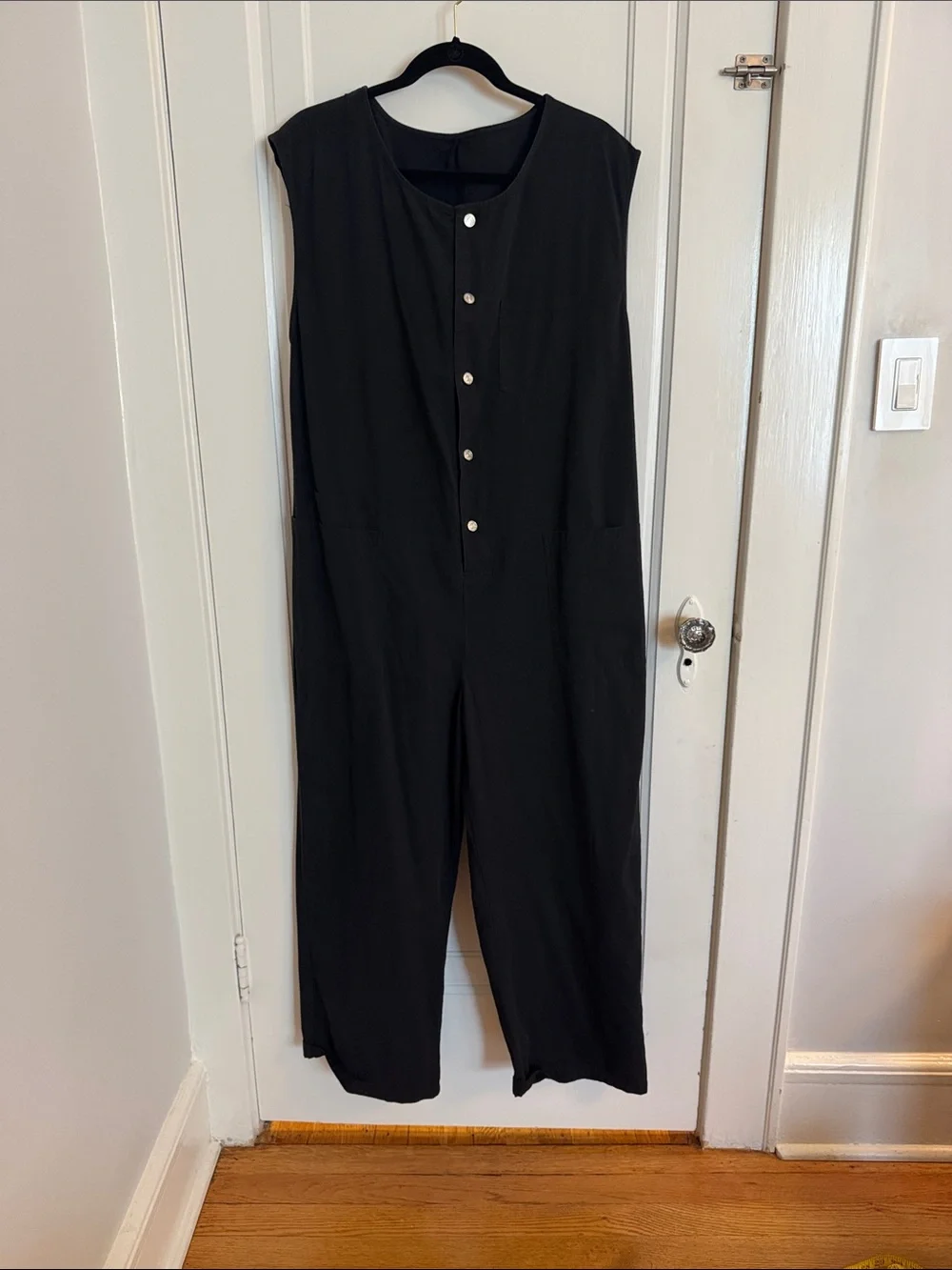 Sleeveless Black Jumpsuit with Front Buttons and utility pockets - Picture 2 of 12